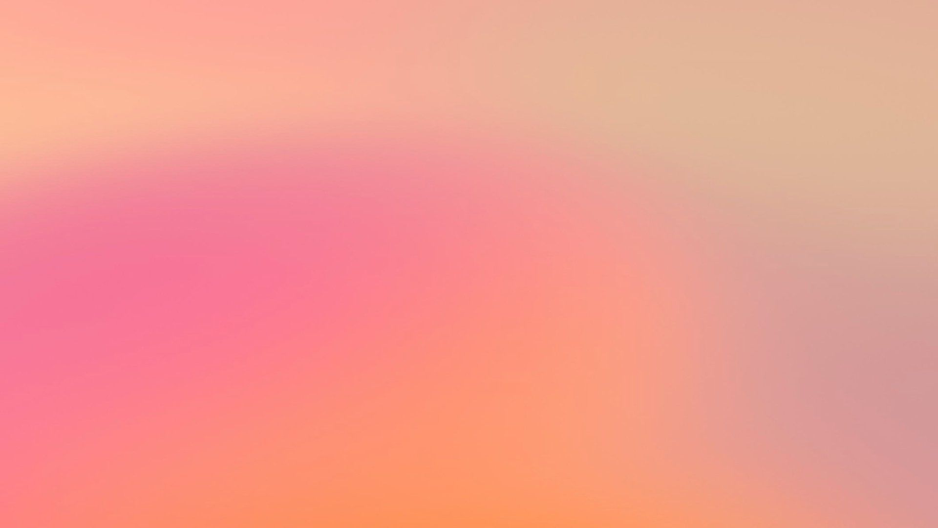 A smooth gradient background blending soft shades of peach, pink, and light orange.